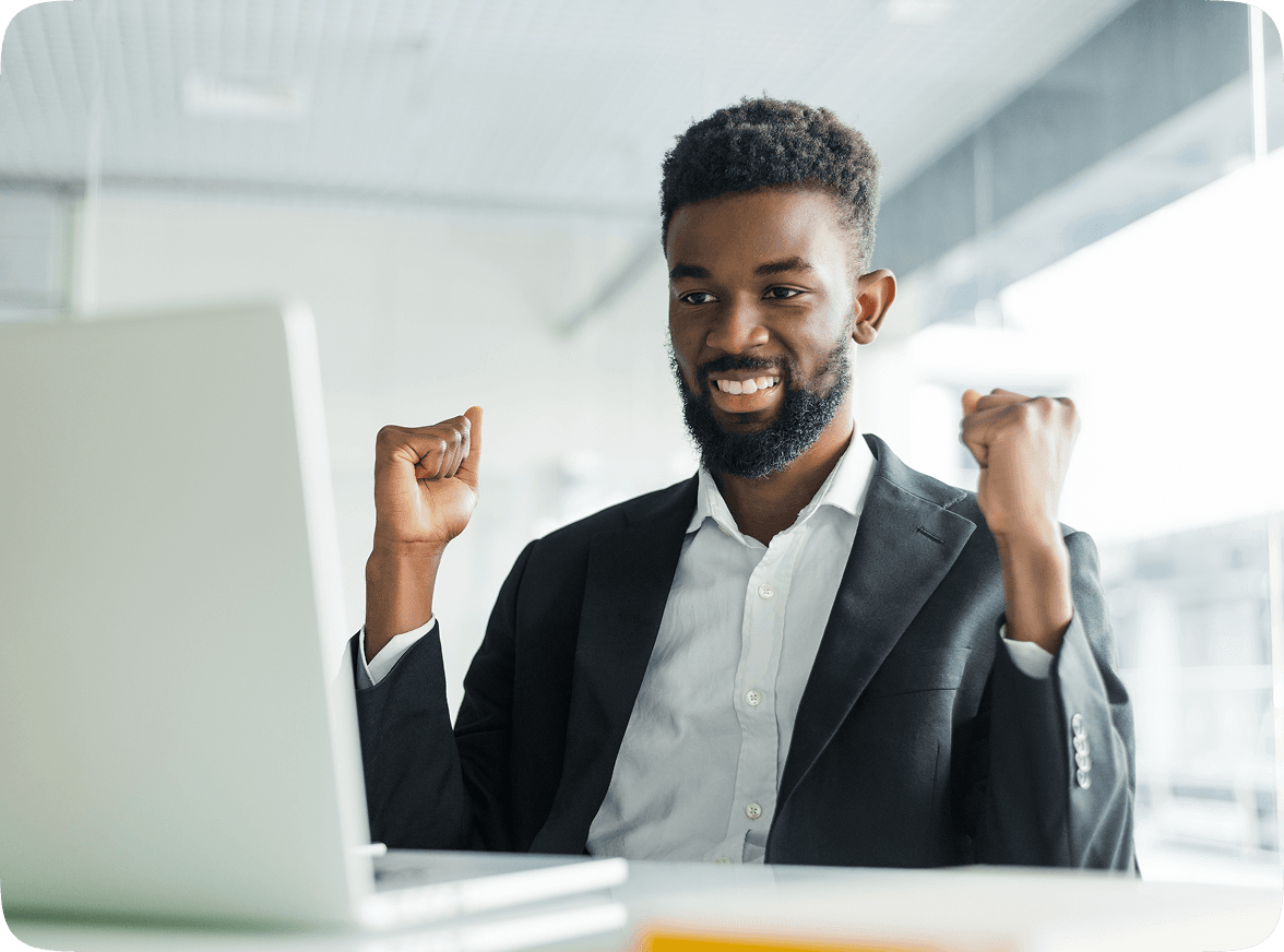 Successful job candidate celebrating during an online interview